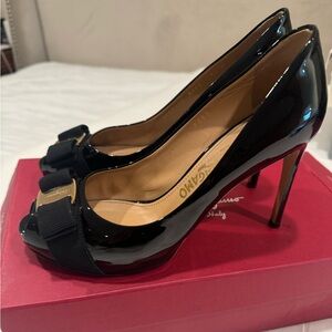 Salvatore Ferragamo Black Patent peep toe pumps.  Size 7. In very good condition